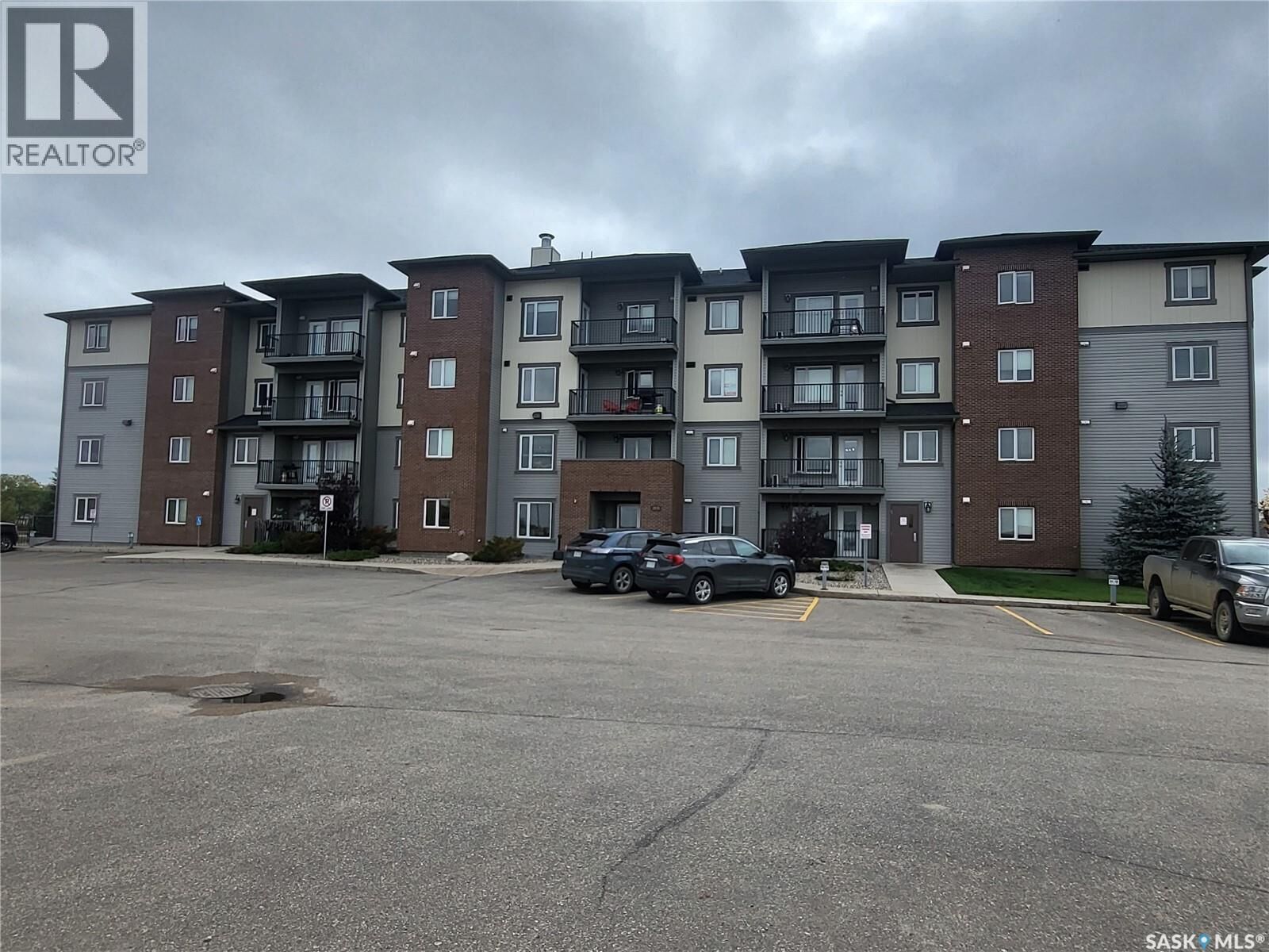 Property Photo:  403 2141 Larter Road  SK S4A 2Y5 
