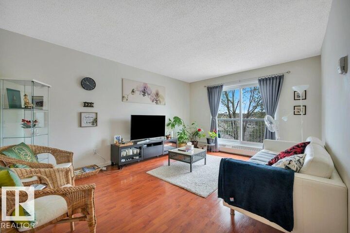 Property Photo:  5065 31 Avenue NW 304  AB T6L 6S5 
