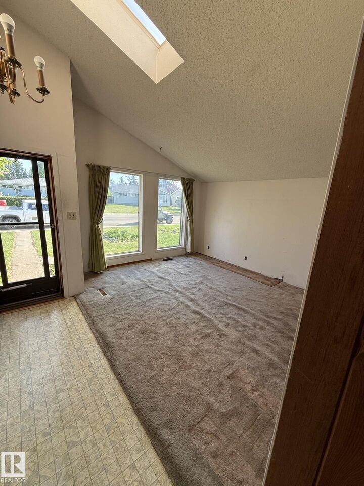Property Photo:  16321 - 109A Ave NW  AB T5P 1C5 