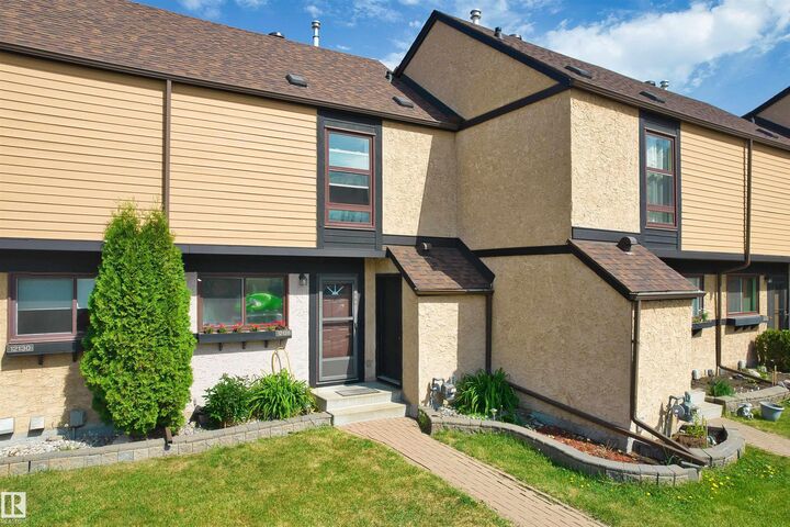 Property Photo: 12128 25 Avenue NW AB T6J 4L4