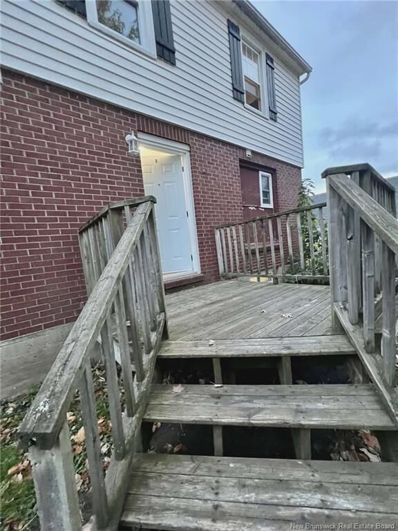 Property Photo: 303 McLaughlin Drive NB E1A 4R1