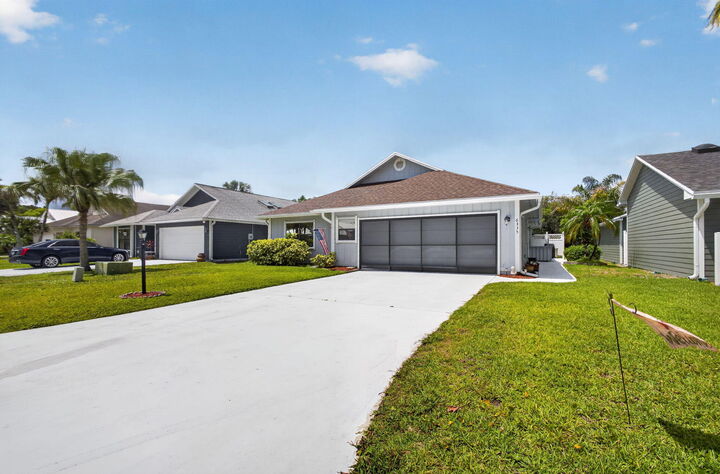 Property Photo:  6335 SE Ames Way  FL 33455 