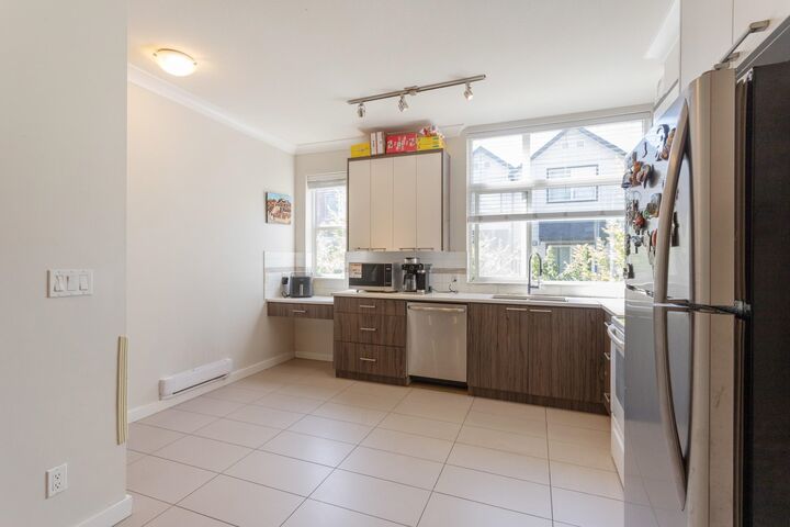 Property Photo: 7533 Gilley Avenue 107 BC V5J 0E8