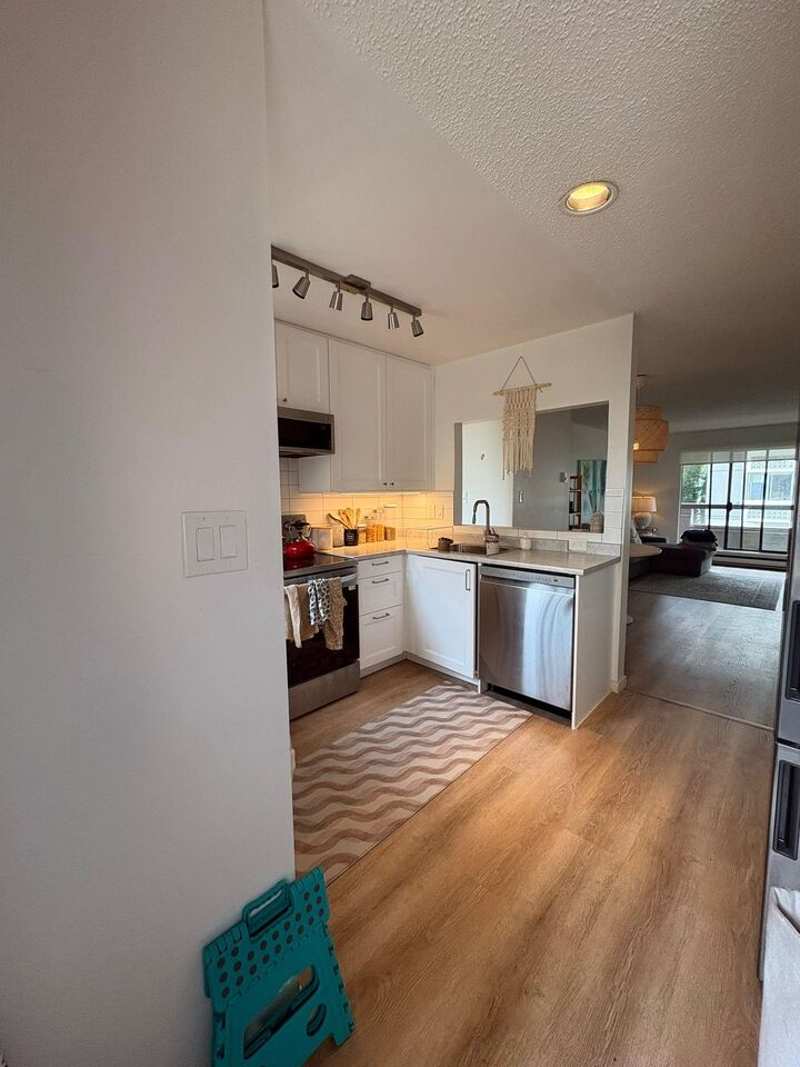 Property Photo:  1363 Clyde Avenue 307  BC V7T 2W9 