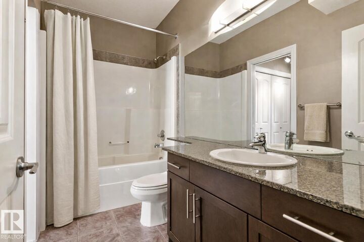 Property Photo:  10121 80 Avenue NW 334  AB T6E 0B9 