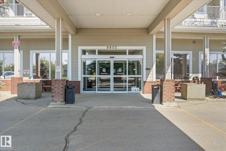 Property Photo: 8802 Southfort Drive 230 AB T8L 4R6