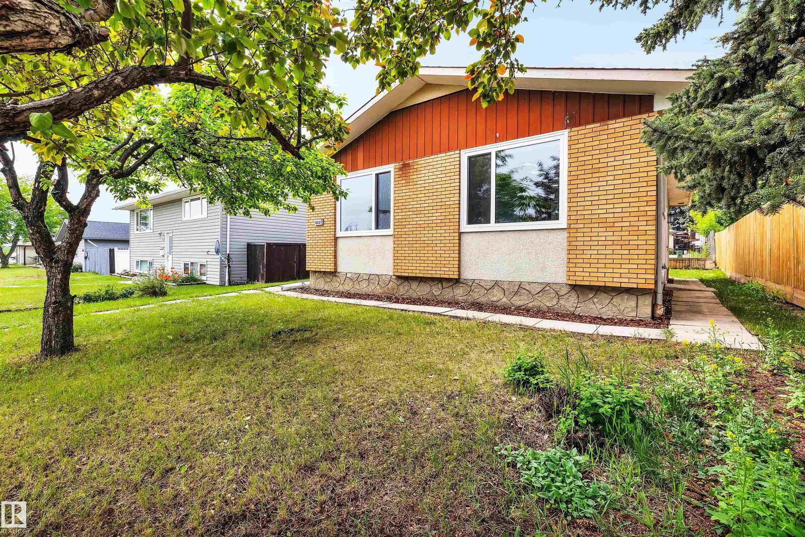 Property Photo: 14208 51 Street NW AB T5A 0A9