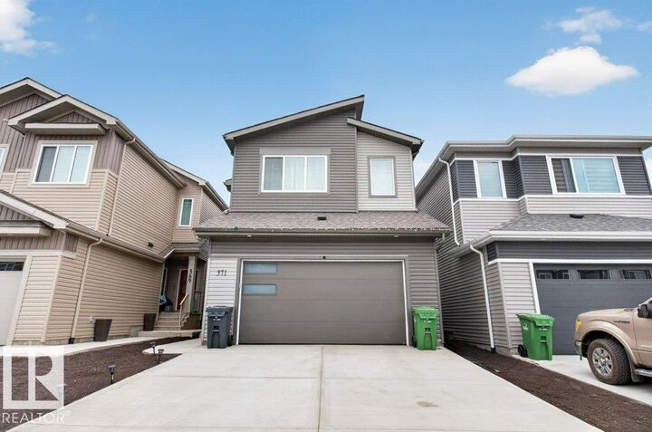 Property Photo: 371 Bluff Cv AB T9E 1M9