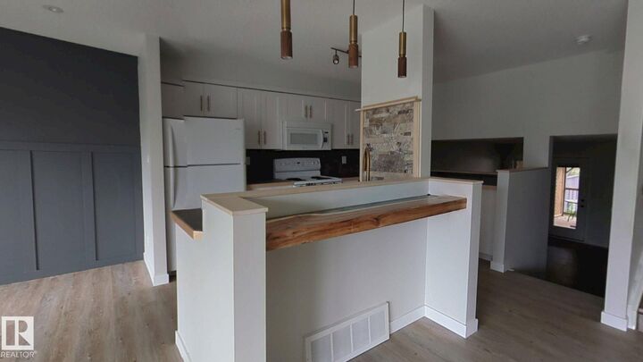Property Photo:  703 Grandin Drive  AB T8R 1K2 