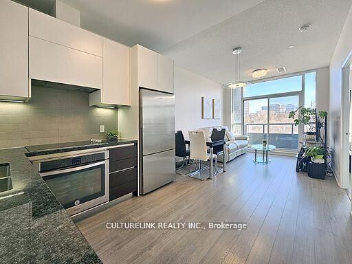 Property Photo: 15 Water Walk Drive 215 ON L6G 0G2