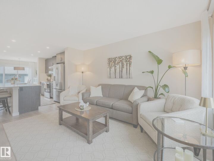 Property Photo: 2426 Trumpeter Way NW AB T5S 0R9