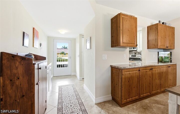 Property Photo:  401 Charlemagne Boulevard A205  FL 34112 