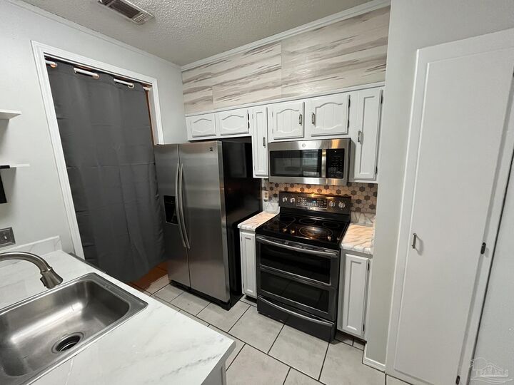 Property Photo: 501 E Burgess Rd C-2 FL 32504