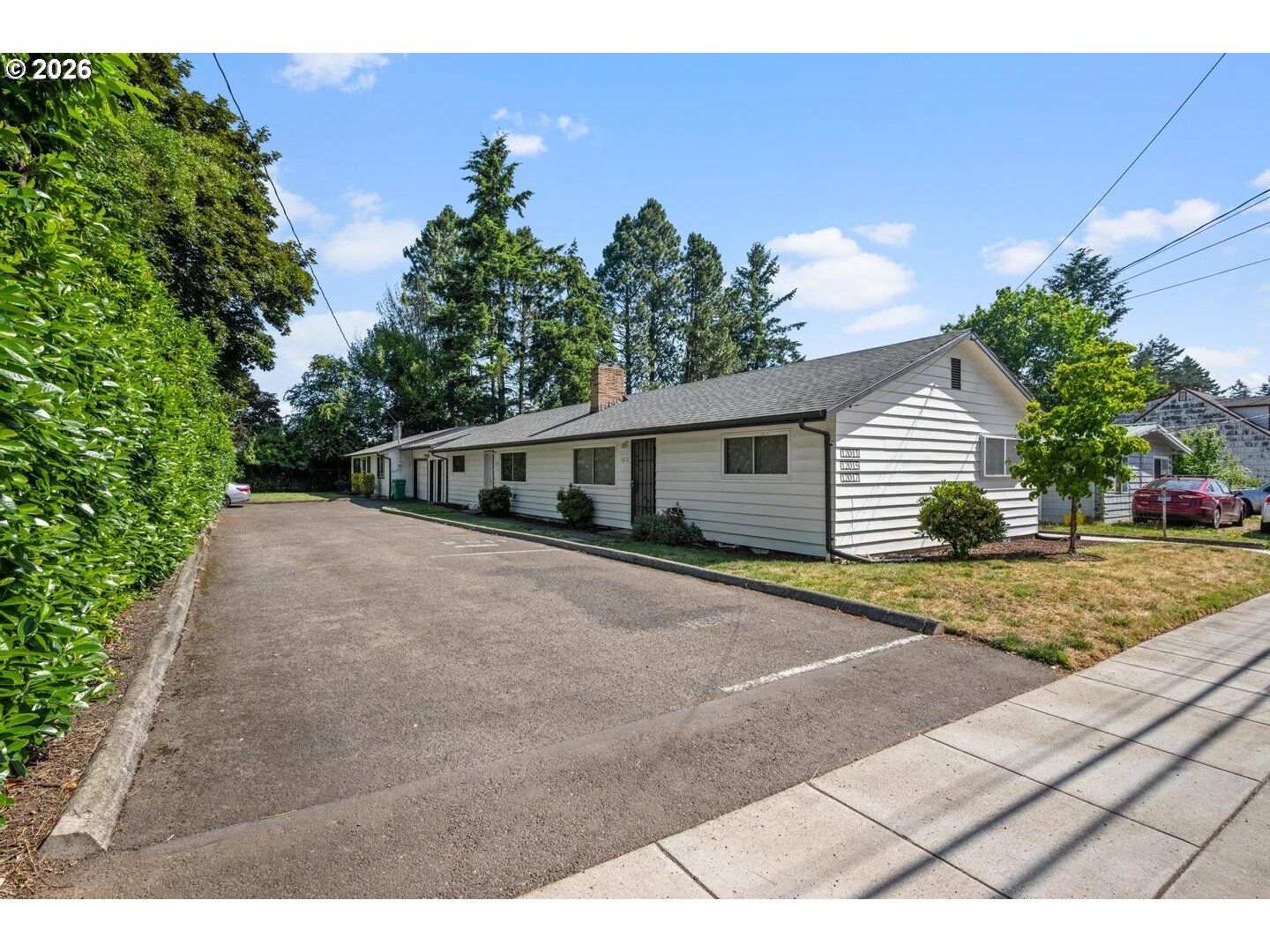 Property Photo:  12011 SE Market St  OR 97216 