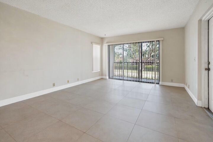 Property Photo:  802 Sky Pine Way F2  FL 33415 