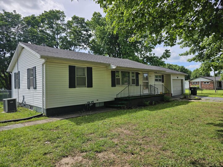 Property Photo:  1115 S Carnation Drive  MO 65605 