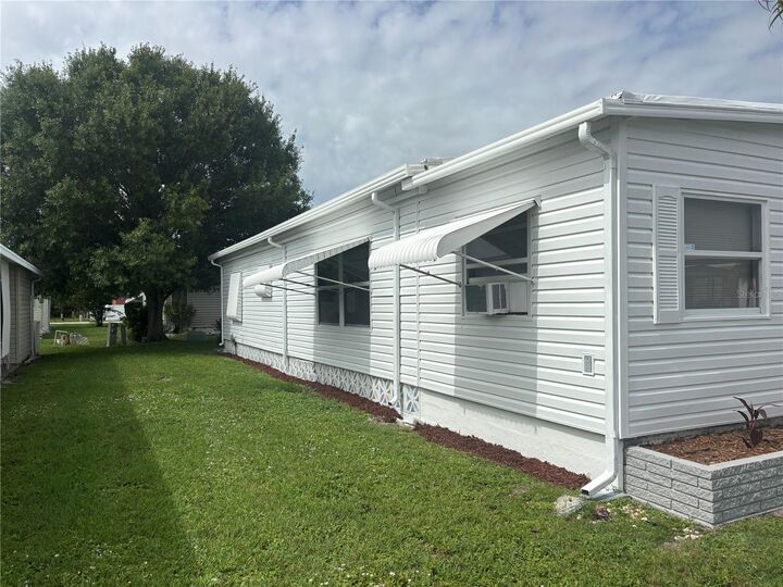 Property Photo:  808 53rd Avenue E 203  FL 34203 