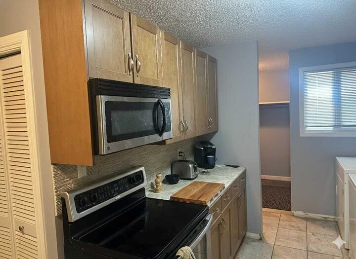 Property Photo: 7201 Poplar Drive 3105 AB T8V 6C5