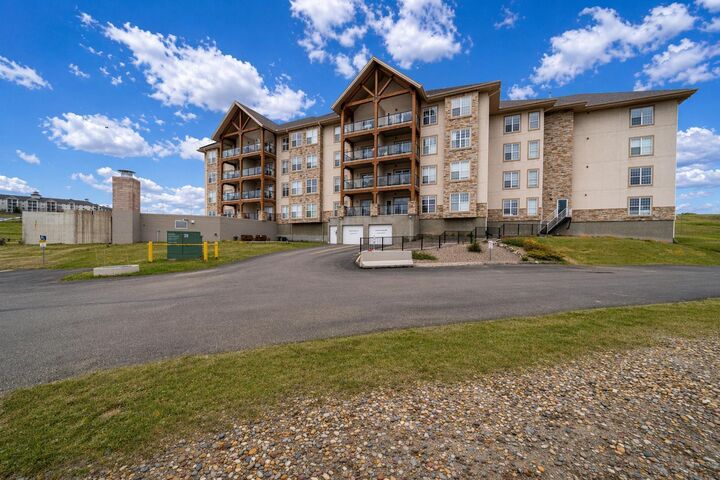 Property Photo:  201 River Ridge Drive NW 327  AB T1A 8V5 