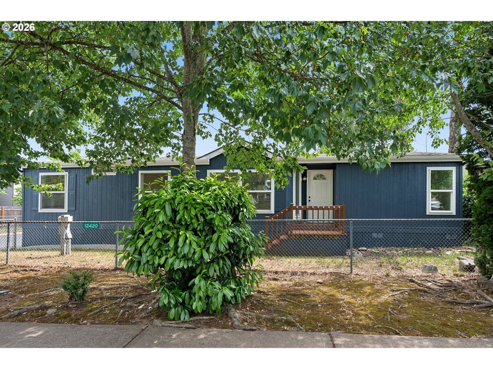 Property Photo:  12420 SE Bush St 1  OR 97236 