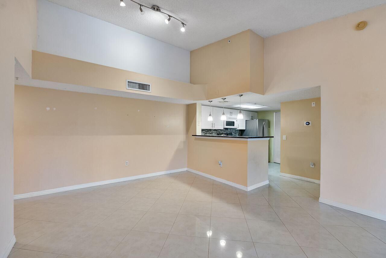 Property Photo: 5011 Wiles Road 303 FL 33073