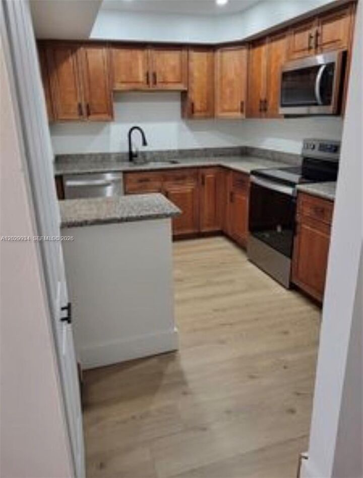 Property Photo:  733 SE 1st Way 109  FL 33441 