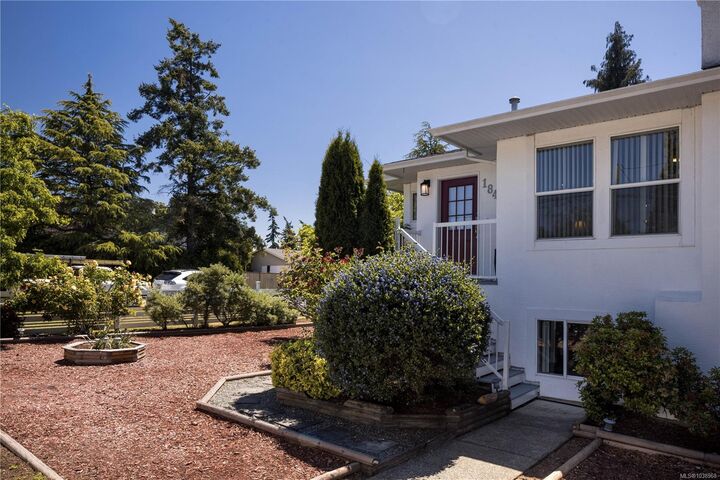Property Photo:  1843 Feltham Rd  BC V8N 2A4 