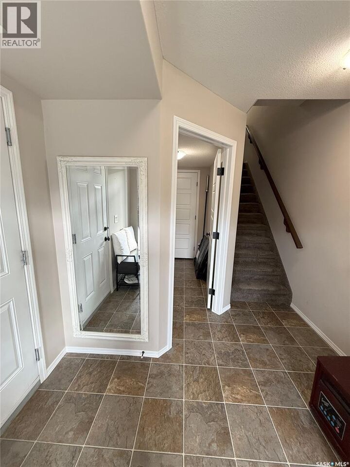 Property Photo:  514 150 Langlois Way  SK S7T 0K8 