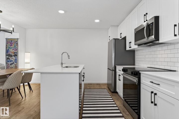 Property Photo:  50 McLaughlin Drive 7  AB T7X 0E1 
