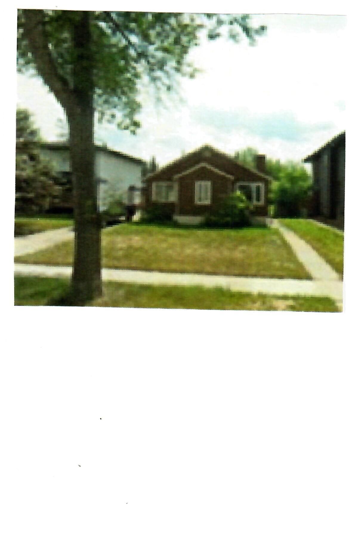 Property Photo:  9143 78 Avenue NW  AB T6C 0N9 