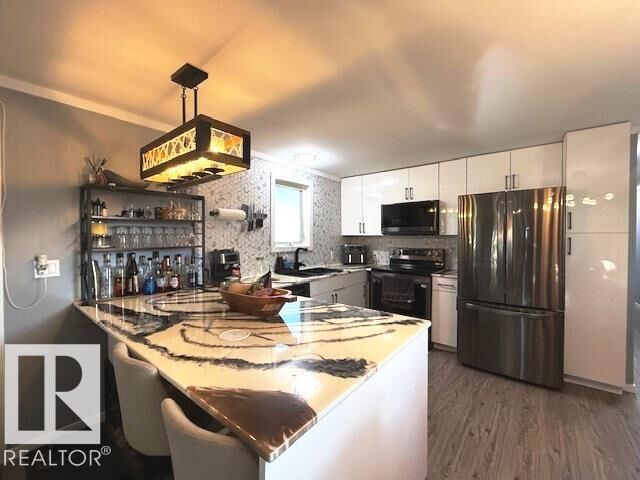 Property Photo: 25 Ridgeway Drive NW AB T6P 1G4