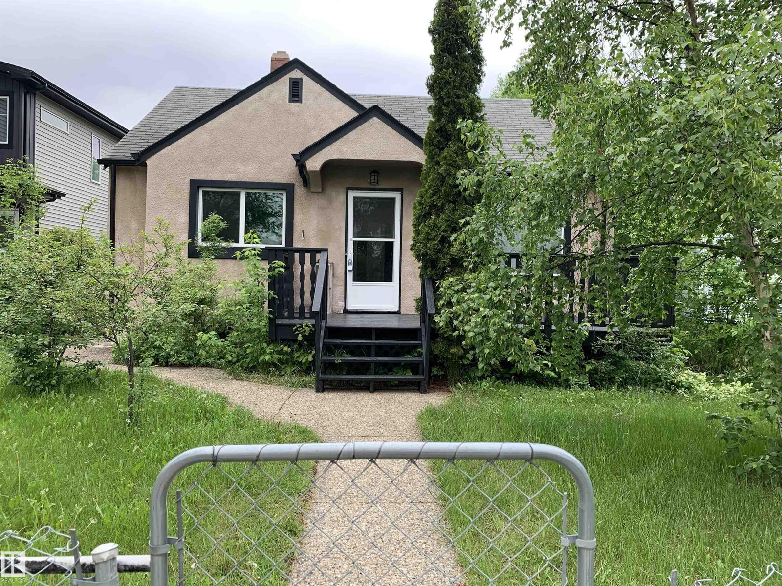 Property Photo: 11842 93 Street NW AB T5G 1E3