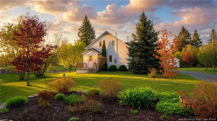 Property Photo:  91 Rue Du Parc Ouest  NB E8J 2Y1 