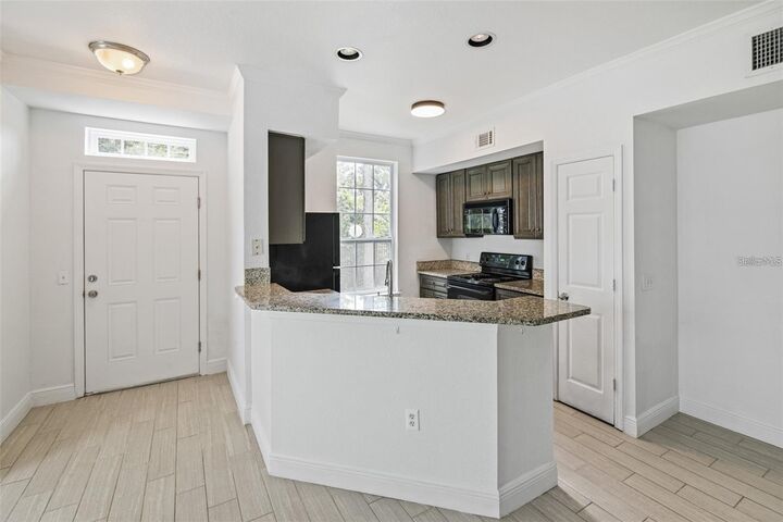 Property Photo:  5571 Rosehill Road 104  FL 34233 