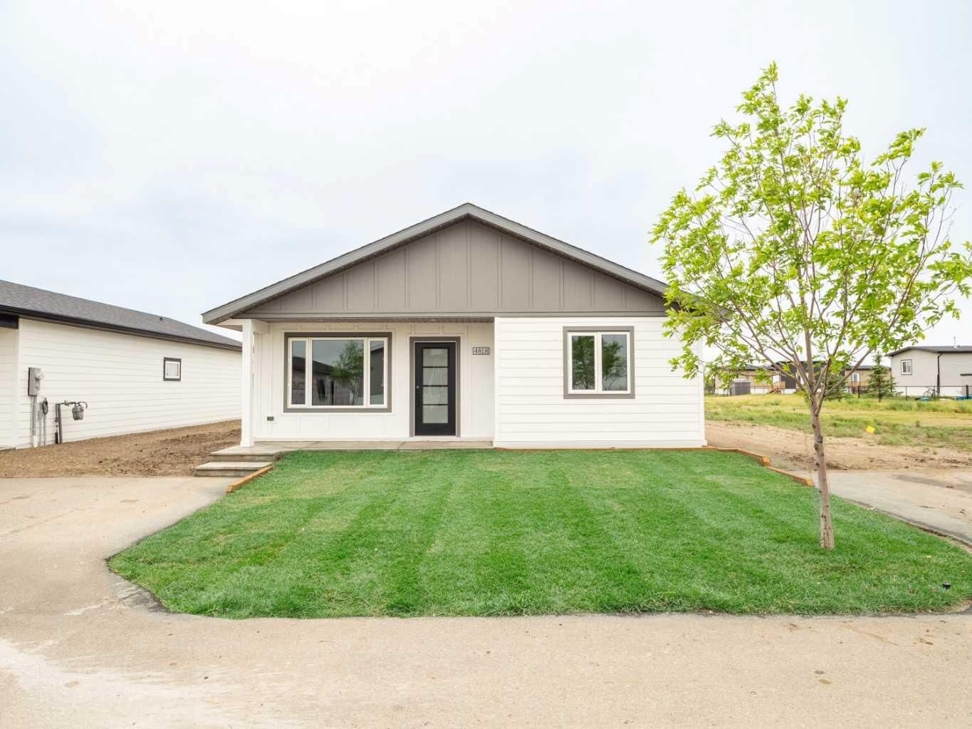 Property Photo:  4818 72 Avenue  AB T1G 0G7 