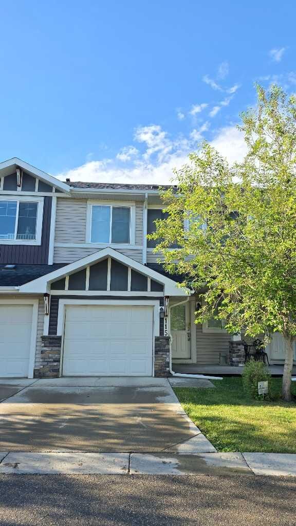 Property Photo: 300 Marina Drive 115 AB T1X 0P6