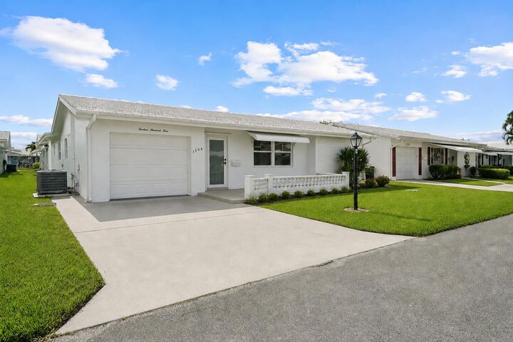 Property Photo: 1304 SW 23rd Street FL 33426