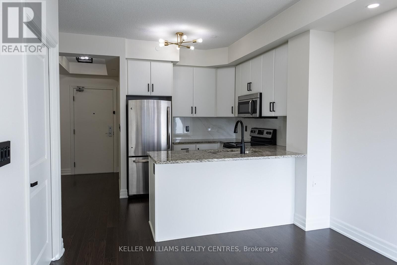 Property Photo:  111 Civic Square Gate West 216  ON L4G 0S6 