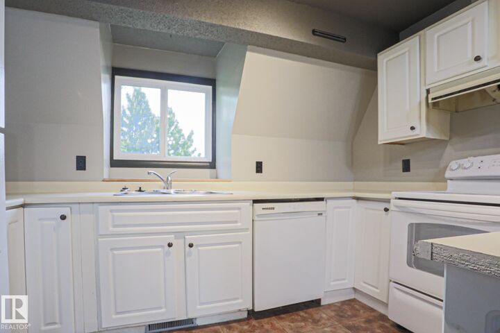 Property Photo: 3959 62 Street NW AB T6L 3A2