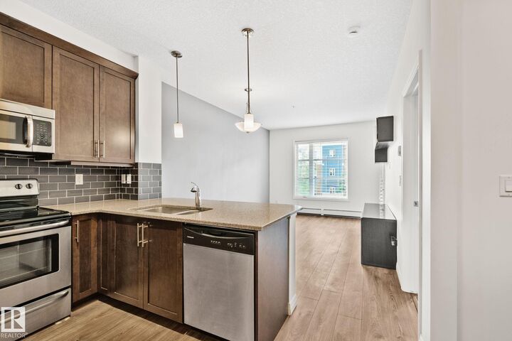Property Photo: 2588 Anderson Way SW 217 AB T6W 0R2