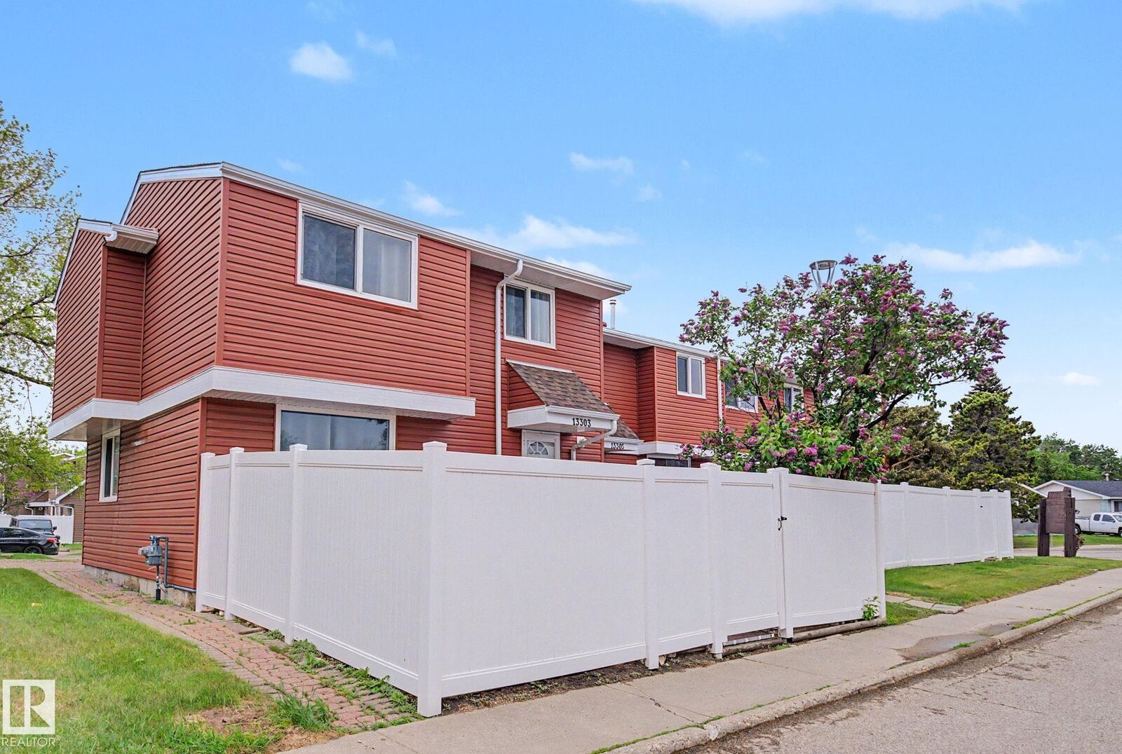 Property Photo:  13303 47 Street NW  AB T5A 3L5 