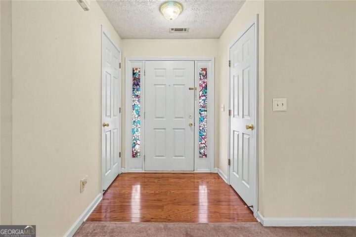 Property Photo:  1496 Virgil Pond Lane  GA 30052 