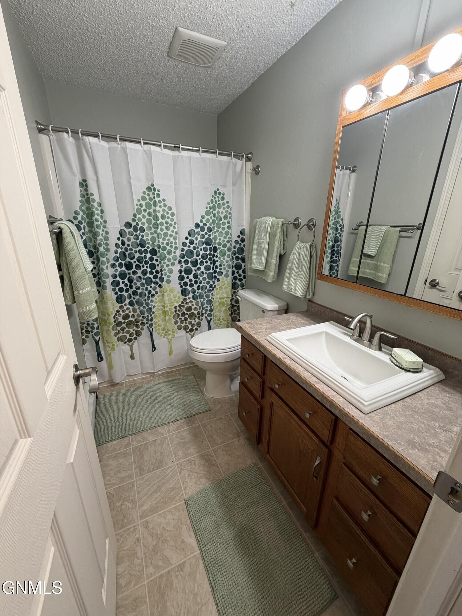 Property Photo: 120 Lake Avenue 4 ND 58504