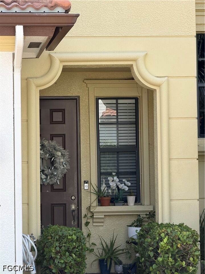 Property Photo:  15790 Portofino Springs Boulevard 104  FL 33908 