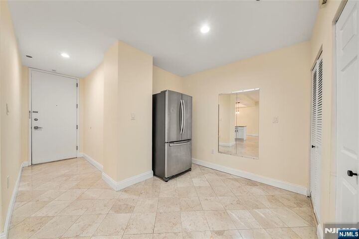 Property Photo:  399 11th 206  NJ 07650 