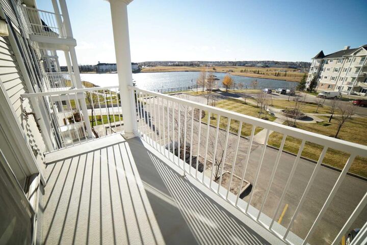 Property Photo:  5 Country Village Park NE 1309  AB T3K 0G1 