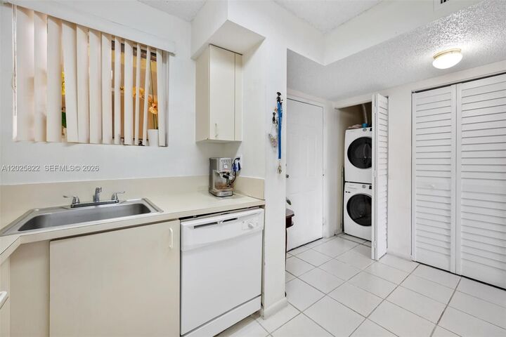 Property Photo:  14951 SW 82nd Ln 17-403  FL 33193 