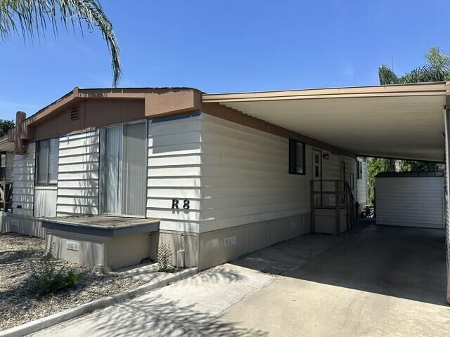 Property Photo:  2400 W Midvalley Avenue R8  CA 93277 