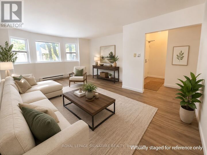 Property Photo: 10 Ivy Avenue 2 ON M4L 2H7