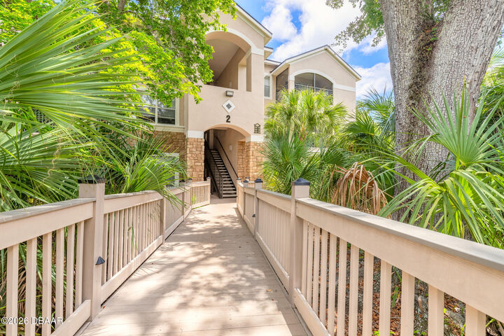 Property Photo:  940 Village Trail 2-208  FL 32127 